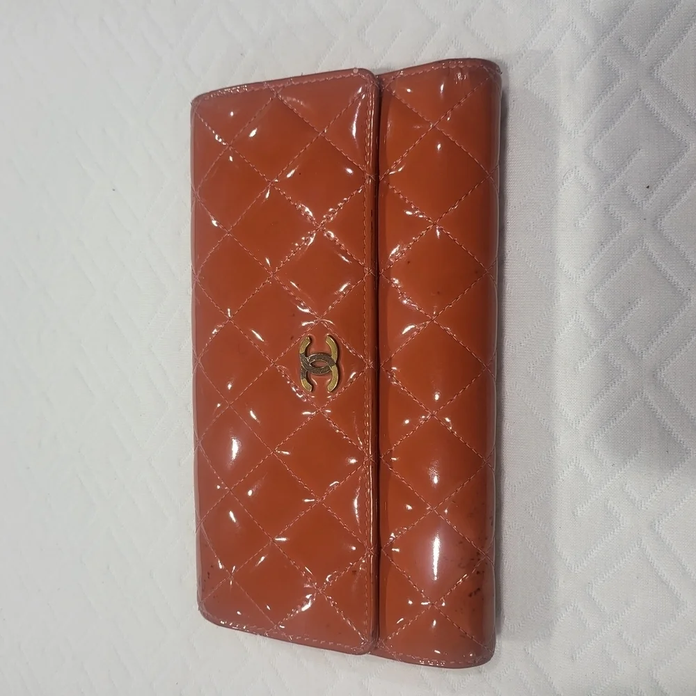 CHANEL Quilted Orange Matelasse Gold CC Logo Patent Leather Long Bifold Wallet.